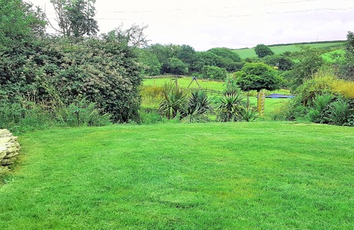 Hele House | Strawfields: Cozy Cottage Steps from the Sea with Games Barn