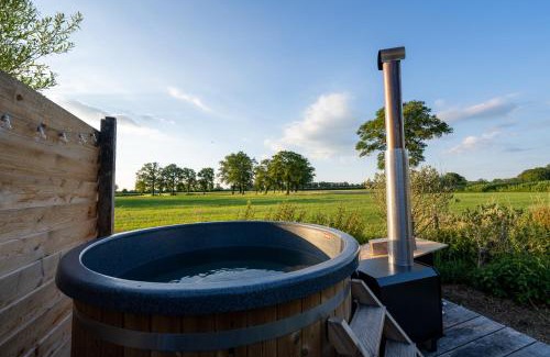 Municipality of Berkelland Apartment | Pet-Friendly Stroeckmanhoeve: Cozy Stay with Hot Tub & Dining