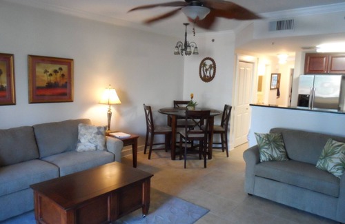 Fort Walton Beach Condo | Premier Poolside Retreat with Patio and Ocean View