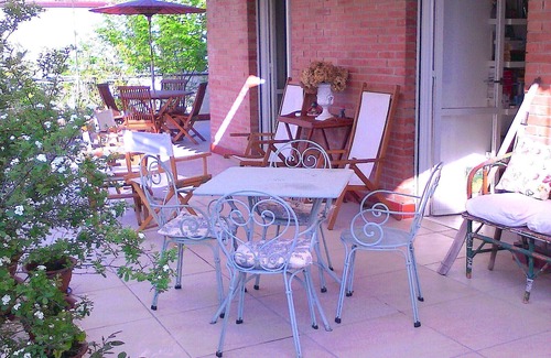 Forte dei Marmi Apartment | Ideal Oceanfront Attic with Balcony, Steps from the Sea
