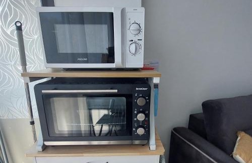 La Plage Apartment | Cozy Studio Steps from the Beach with Ocean View