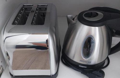 La Plage Apartment | Cozy Studio Steps from the Beach with Ocean View