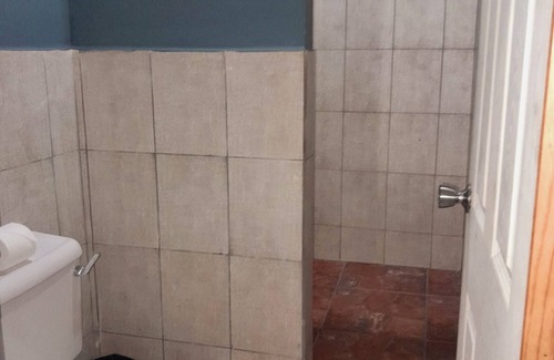Piarco House | Affordable Studio 27 Inn with Spa & Family-Friendly Amenities