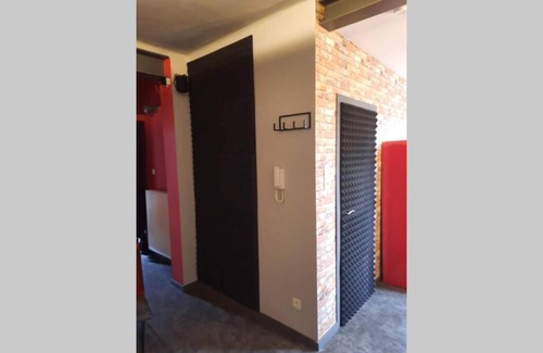 Libramont-Chevigny Apartment | Immerse Yourself in Studio 8: Your Private Cinema Escape