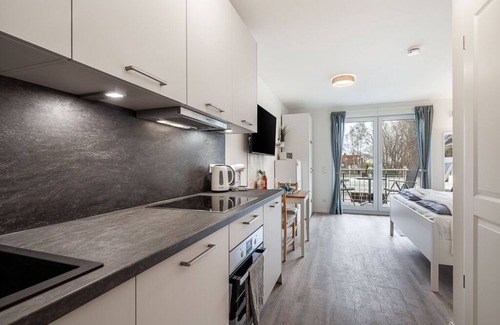Neustadt in Holstein Apartment | Stylish Studio Apartment with Balcony Near the Port
