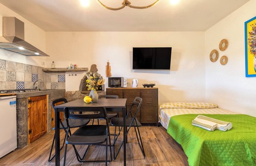Trinita d'Agultu Apartment | Sea View Studio Apartment 'Stazzo Jana' with Private Terrace
