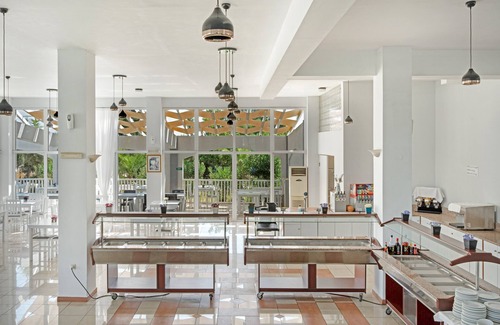 Kardamena Apartment | Relax in Evripides Triple Room with Pool and Garden Access