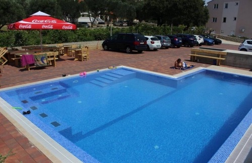 Caska Apartment | Seaview Studio Apartment in Novalja with Terrace & Pool