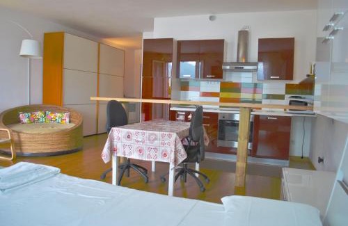 Argegno Apartment | Bright Studio Apartment with Terrace & Family-Friendly Amenities