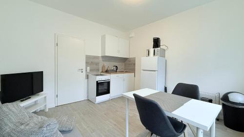 Neumuenster Apartment | Cozy Studio Apartments Near City, Family-Friendly Amenities