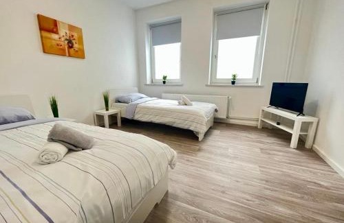 Neumuenster Apartment | Cozy Studio Apartments Near City, Family-Friendly Amenities