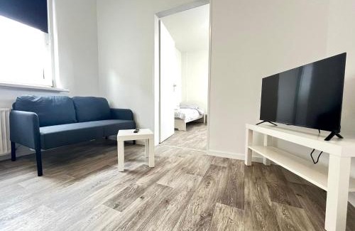 Neumuenster Apartment | Cozy Studio Apartments Near City, Family-Friendly Amenities