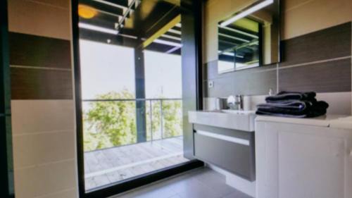 Neudorf Ouest Apartment | Stylish Studio with Terrace at DOCKS - Rated 8.7/10