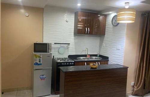 Lagos Apartment | Cozy Studio B at Hillside Gardens with Family-Friendly Amenities