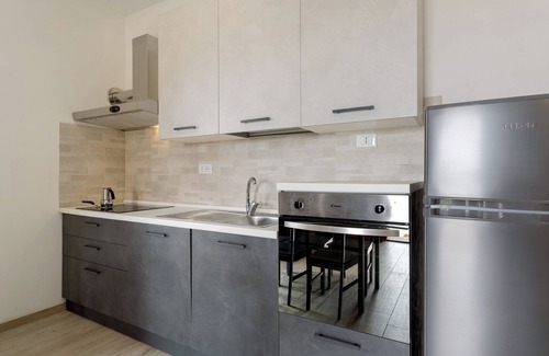 Zignago Apartment | Studio 'Camera 4' with Mountain View, Wi-Fi and Air Conditioning