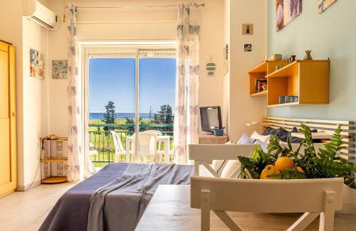 Porticato Apartment | Oceanfront Family Retreat at Studio Coral View
