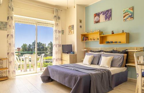 Porticato Apartment | Oceanfront Family Retreat at Studio Coral View