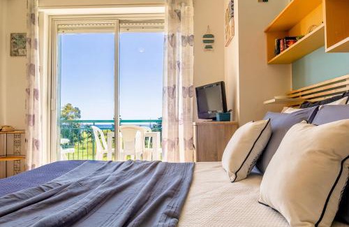 Porticato Apartment | Oceanfront Family Retreat at Studio Coral View