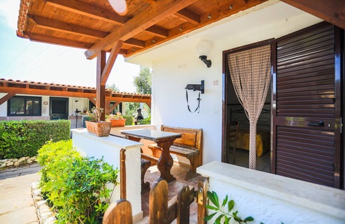 Montincello Apartment | Cozy Studio for Two, Steps from the Sea with Pool Access