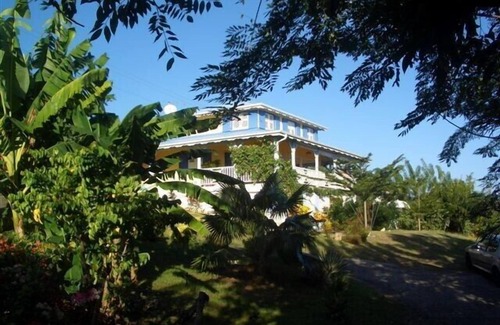 Le Francois Cottage | Charming Studio with Ocean View in Tropical Garden Retreat