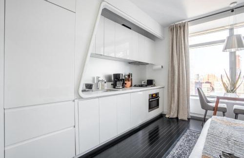 Financial District Apartment | Modern Studio in Tribeca with Rooftop Deck & Gym Access