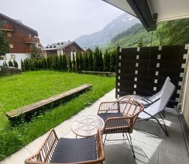Leukerbad Apartment | Delightful Studio with Terrace and Large Garden Oasis