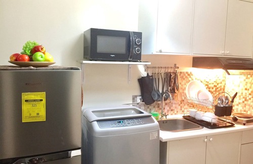 Phil-Am Apartment | Convenient Studio Near Malls & MRT with WiFi and Netflix