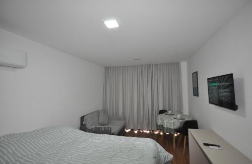 Sao Benedito Apartment | Central Studio with Ocean View and Pool Amenities