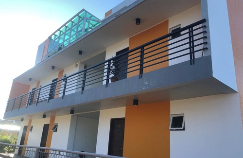 Bacnotan Apartment | Ocean Breeze Deluxe Suite with Pool and Family Amenities