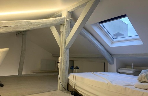 Quartier du Pont-de-Flandre Apartment | Stylish Studio Loft for Your Next Getaway