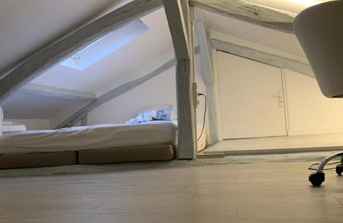Quartier du Pont-de-Flandre Apartment | Stylish Studio Loft for Your Next Getaway