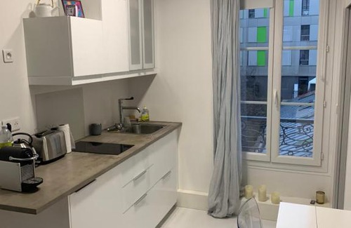 Quartier du Pont-de-Flandre Apartment | Stylish Studio Loft for Your Next Getaway