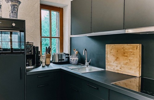 Flattach Apartment | Cozy Studio Waterfall with Kitchen & Breakfast Included