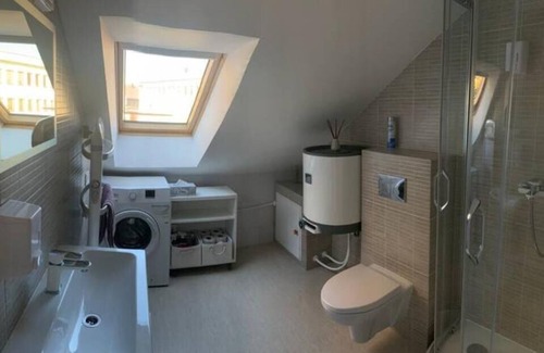 Klaipeda Apartment | Cozy Study Bucket: Family-Friendly with Spa & Hot Tub
