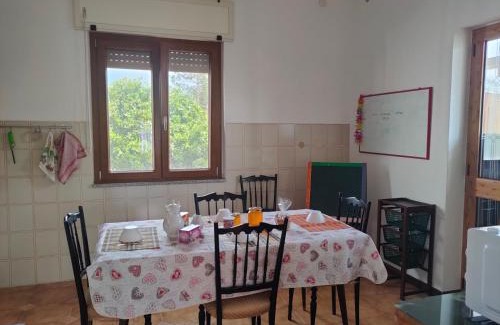 Portoscuso Apartment | Delightful Home with Kitchen and Family-Friendly Amenities
