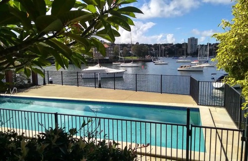 Kirribilli Apartment | Inviting 2BR Waterfront Retreat with Pool Access