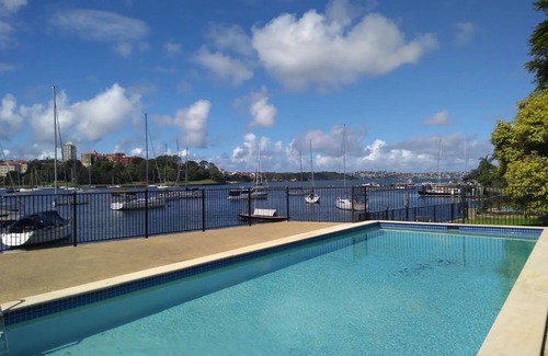 Kirribilli Apartment | Inviting 2BR Waterfront Retreat with Pool Access