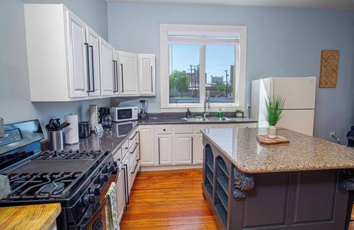 Near East Side Cottage | Exclusive 3BR/2BA Retreat in Downtown's Vibrant Core