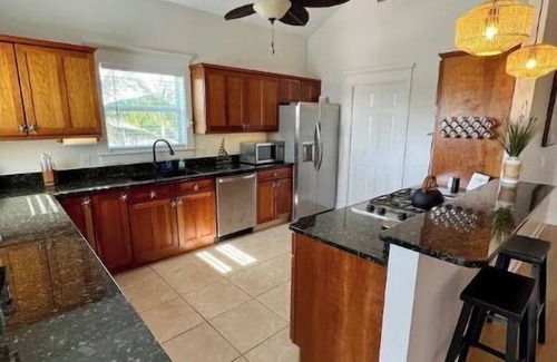 Jensen Beach House | Elegant 4/3 Retreat with Heated Pool & Scenic Water View