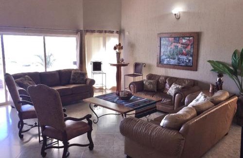 Sandy Beach Villa | Beachfront 4 Bedroom Villa with Pool & Hot Tub at Las Palmas