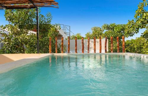 Ek Balam Village Villa | Elegant 4BR Retreat with Rooftop Pool - Steps to the Beach