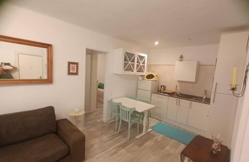 Caldes d'Estrac Apartment | Beachfront Apartment with Spa and Family-Friendly Amenities