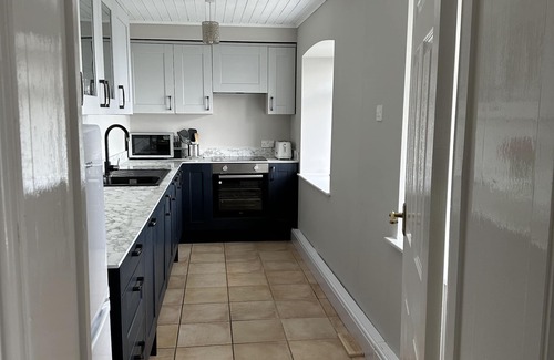 New Quay Apartment | Seaside Escape: Watch Dolphins from Your Beachfront Apartment