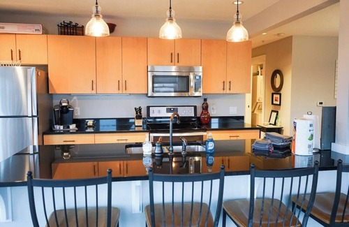 Grand Haven Condo | Beautiful Condo with Ocean Views in the Brezza Building