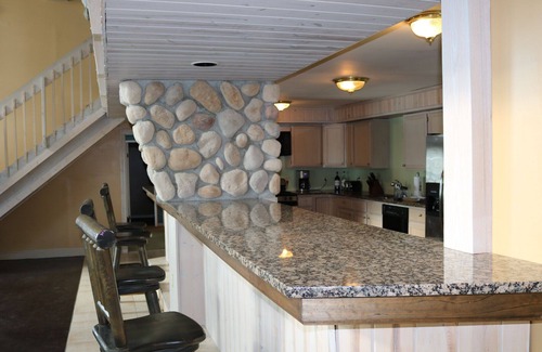 Houghton Lake House | Lakefront Five Bedroom Retreat with Ocean Views in Michigan
