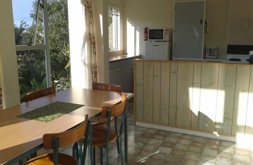 Coromandel Apartment | Serene Harbour Views with Pool and Breakfast Included