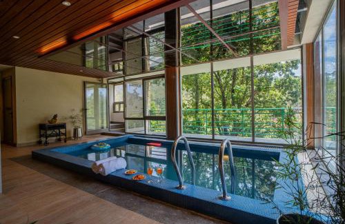 Shyamkhet Villa | Stunning Hillside 3 BHK Gateway With Indoor Pool, Attic and Classy Interiors