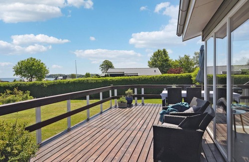 Hejlsminde Strand House | Cozy Holiday Home with Ocean Views and Sun Terrace
