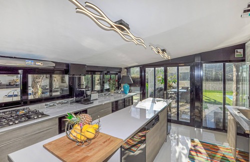 Les Cluses House | Relax in a Poolside Vacation Home with Terrace Bliss