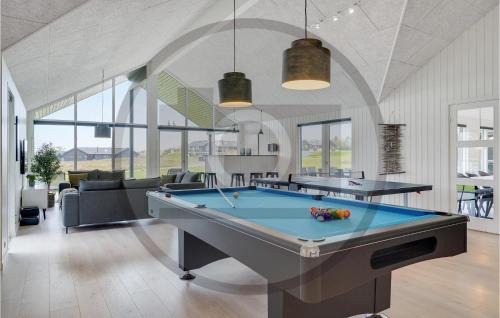 Kongsmark House | Elegant 9 Bedroom Retreat with Pool in Rømø